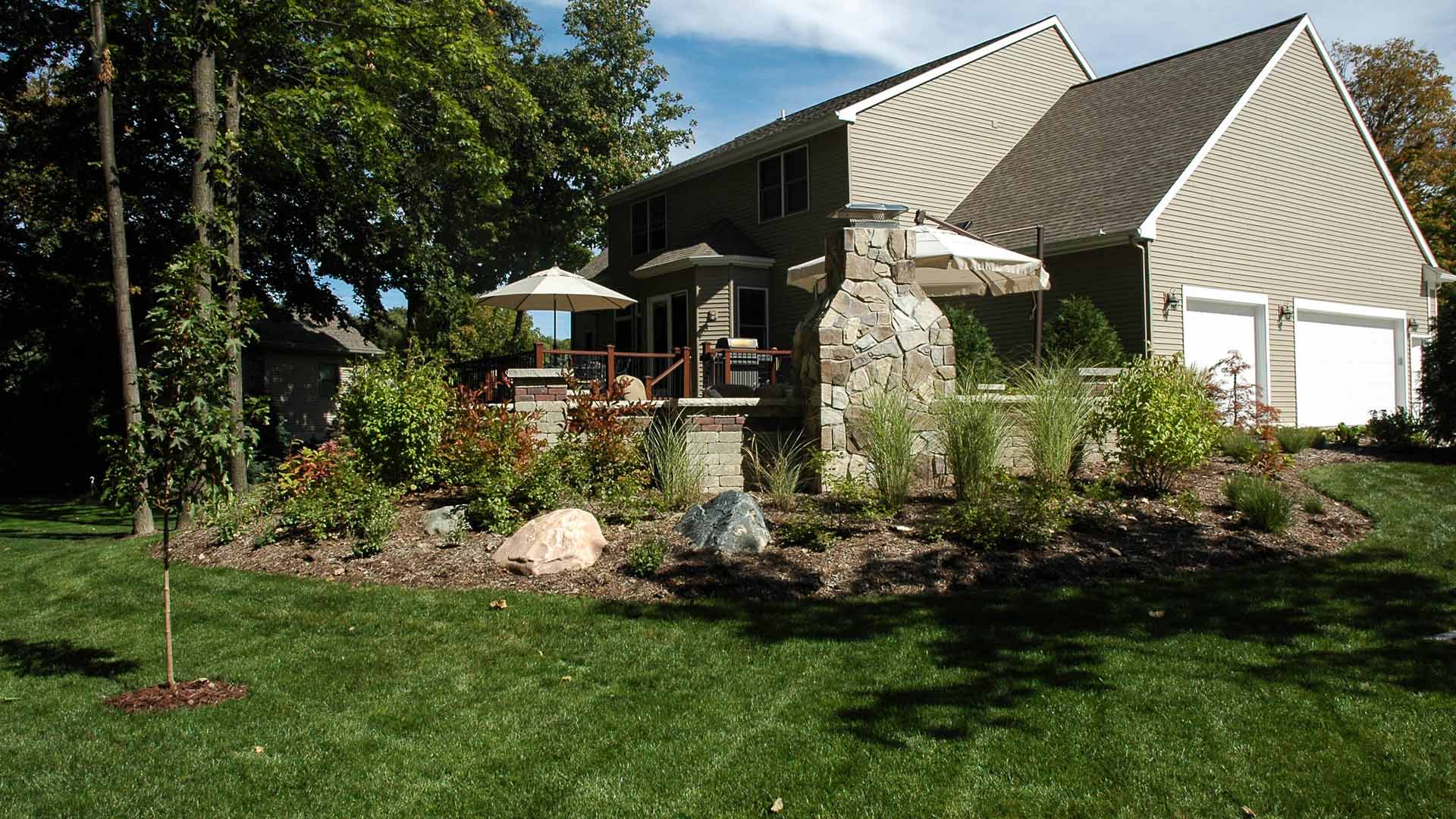 A home with their lawn and landscape maintained in Grand Ledge, MI.