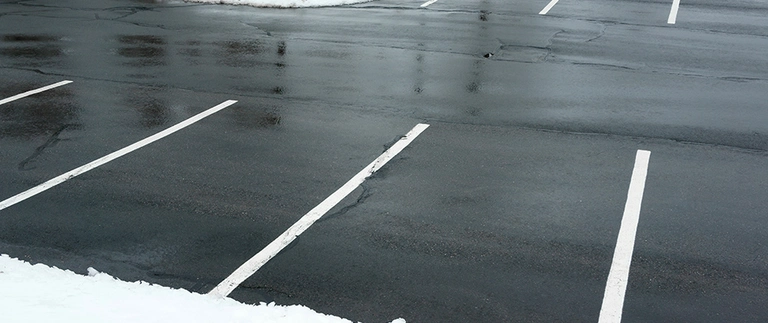 content-cleared-parking-lot-of-snow