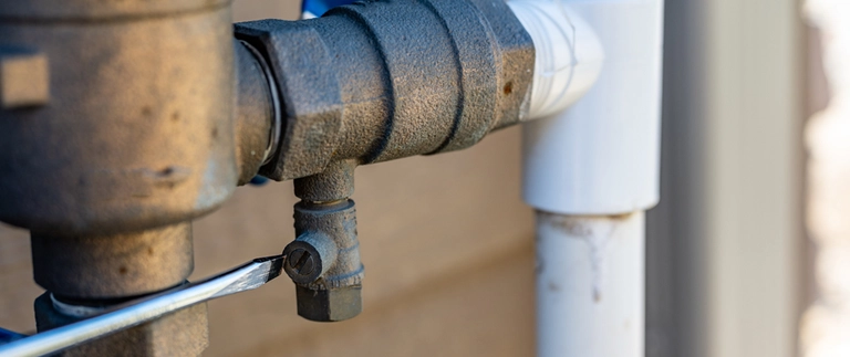 content-specialist-starting-up-irrigation-system